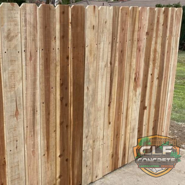 Wood fence installation backyard
